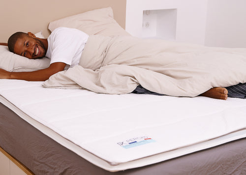 sur le surmatelas